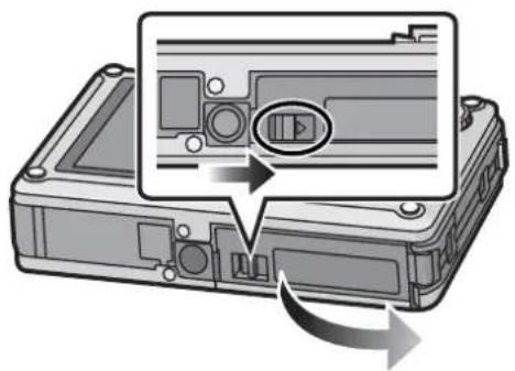 PANASONIC Lumix DMC-FT1EG-G - Slide the release lever in the direction of the arrow and open the card/battery door. - 1