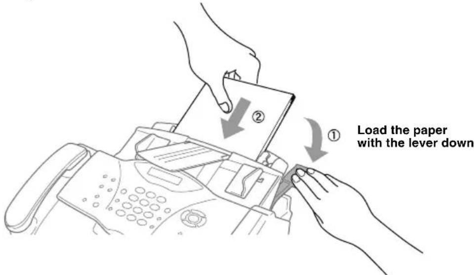 ① Load the paper with the lever down