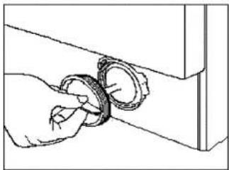 Hand inserting a mechanical component into a housing (no text or symbols visible)
