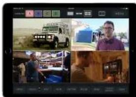 Screenshot of a video editing interface displaying four video thumbnails: a vintage off-road vehicle, a person in a blue shirt, a group photo with people, and a small house.