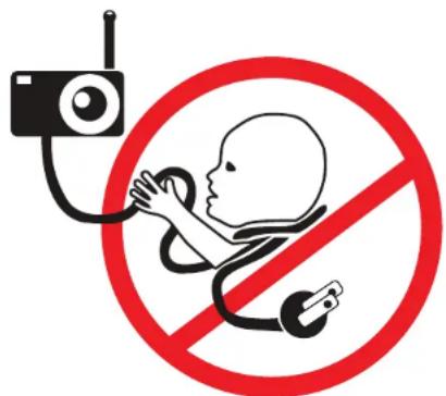 Prohibition sign showing a baby with a stethoscope and a radio, crossed out by a red circle.