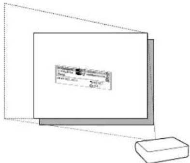 Diagram showing a computer monitor with a small display screen and a rectangular device beside it, likely illustrating a desktop interface or setup.