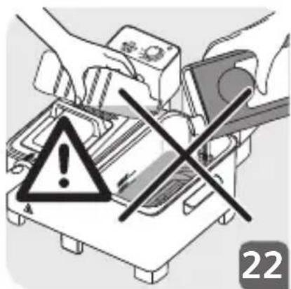 Diagram showing a hand operating a device with warning symbols and a cross mark, labeled '22' in corner.