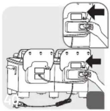 Diagram showing a hand holding a device with an arrow pointing to a component, labeled with number 49.