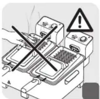 Diagram showing a hand using a crossed-out kitchen grater with warning symbols and a warning triangle