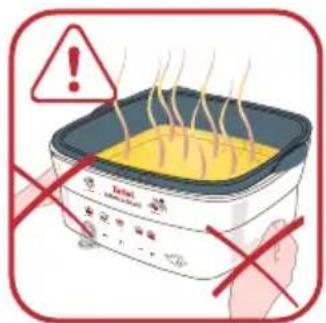 Illustration of a microwave oven with warning symbols and a hand holding the pan, indicating heat resistance or cooking hazard.