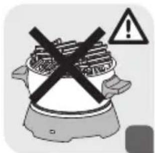 Warning sign with crossed-out black 'X' symbol and exclamation mark, indicating no warning or caution in a cooking or heating context.