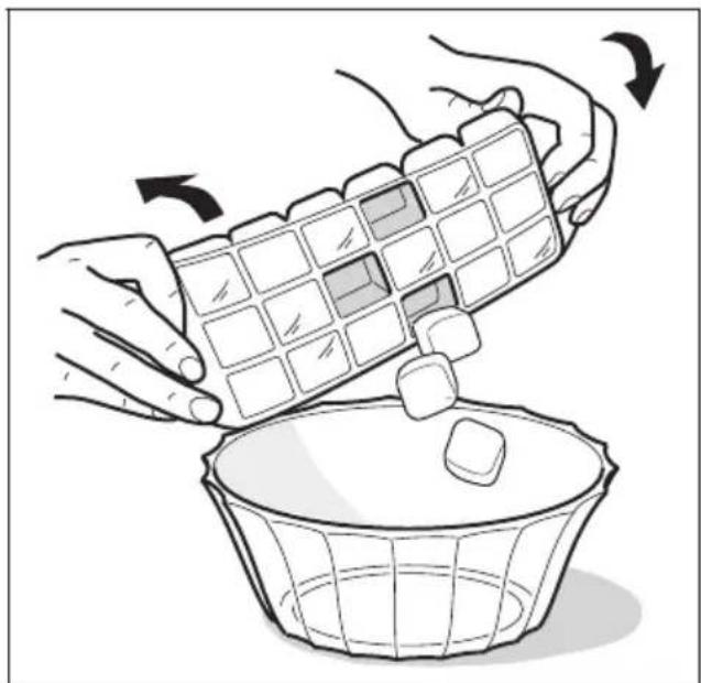 Illustration of hands placing a 3D cube-shaped object into a bowl with an arrow indicating rotation (no text or symbols)
