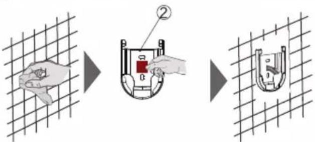 Diagram illustrating a three-step process of cleaning a wall-mounted device, showing step ② with a red component being inserted.