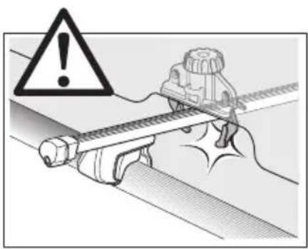 Warning symbol and mechanical diagram showing a warning sign, warning triangle, and a tool on a conveyor belt