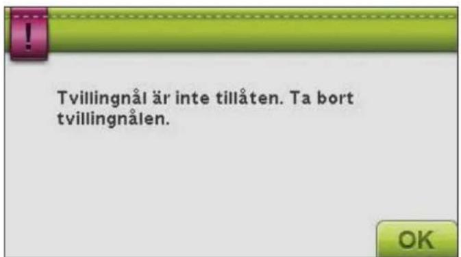 Tvillingnål är inte tillåten. Ta bort tvillingnålen.