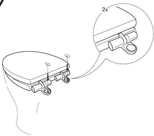 Technical line drawing of a toilet seat assembly with a magnified inset showing the 2x side view (no text or symbols present)