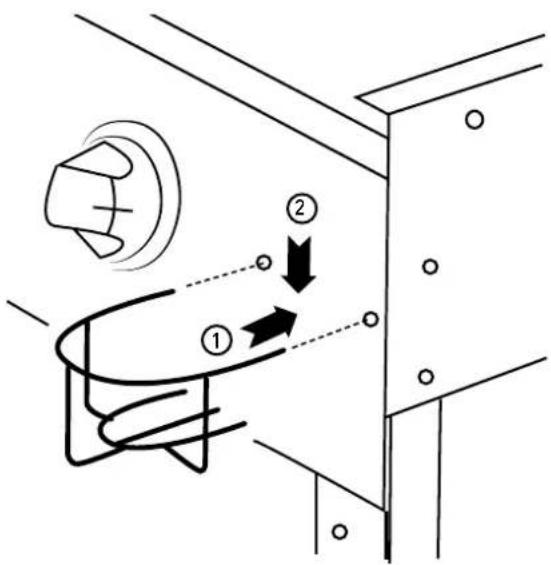 Diagram showing a hand holding a device with labeled components and directional arrows indicating movement or flow.