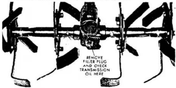 REMOVE FILLER PLUG AND CHECK TRANSMISSION OIL HERE