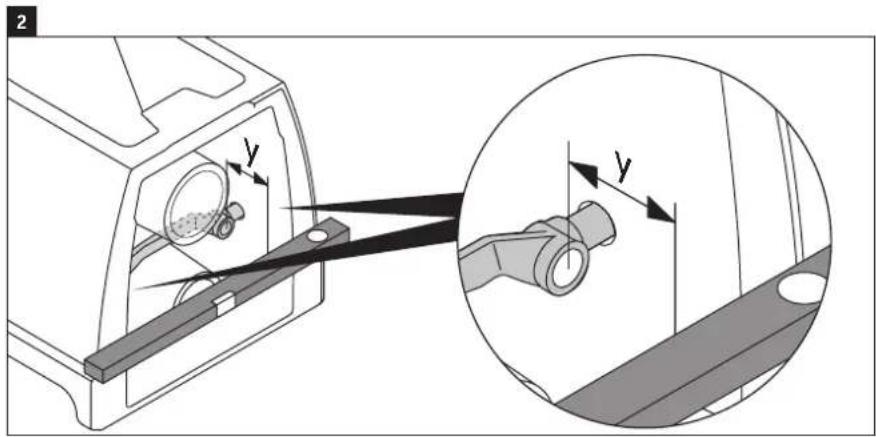 Technical diagram showing mechanical assembly with labeled components and a magnified inset view of a pipe fitting detail.