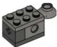 Illustration of a LEGO brick with multiple black blocks and a gray handle (no text or symbols)