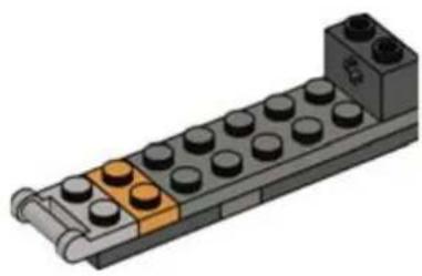 3D illustration of a LEGO base with black and orange components (no text or symbols)