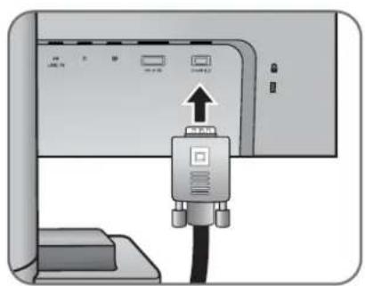 Diagram showing a computer monitor with an attached device labeled '移动硬盘' (Move硬盘) and an upward arrow indicating the next component.