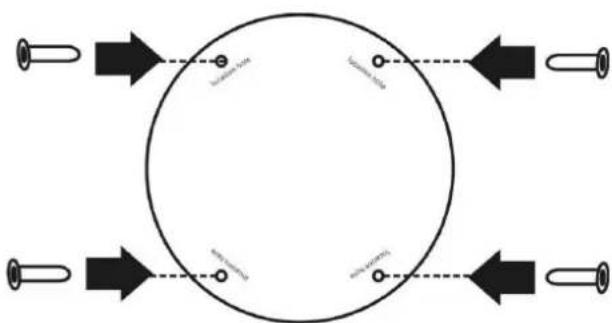 Pure diagram of a circular component with four terminals and directional arrows, no text or symbols present.