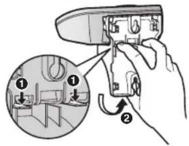 Diagram showing hand operating a tool with labeled parts and directional arrows indicating movement or adjustment.