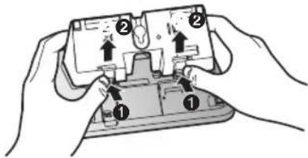 Diagram showing two hands holding a device with numbered components and directional arrows indicating movement or assembly.
