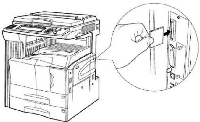 Line drawing of a printer with an open lid and a magnified inset showing the close-up of the component (no text or symbols)