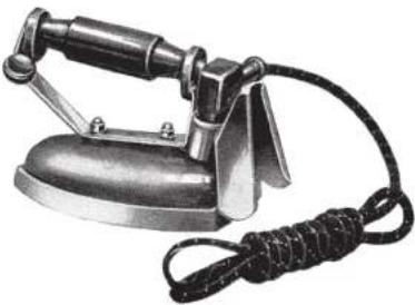 Vintage iron iron with coiled cord and handle (no visible text or symbols)