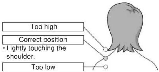 Too high Correct position • Lightly touching the shoulder. Too low