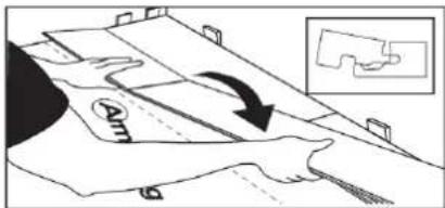 Diagram illustrating a hand pressing down on a document with an arrow indicating motion, labeled 'Am' and a magnified inset showing a hand holding a piece.