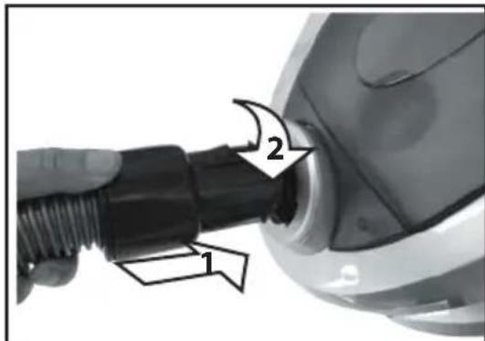 Close-up of a hand holding a black connector with labeled parts 1 and 2, showing a mechanical assembly.
