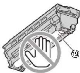 Diagram showing a hand holding a device with a prohibition symbol and number 19