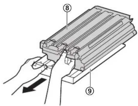 Diagram showing a hand pressing a component labeled with parts 8 and 9, indicating a process or assembly step.