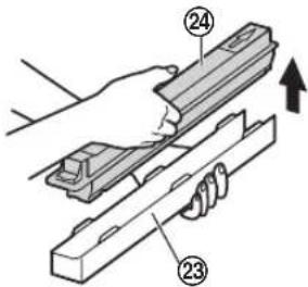 Technical diagram showing a hand operating a mechanical component with labeled parts 23 and 24, indicating assembly or assembly steps.