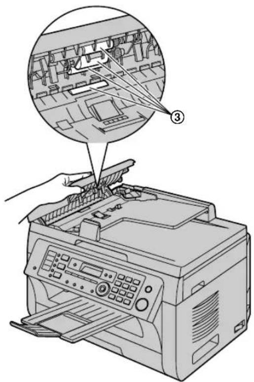 Diagram showing printer operation with labeled parts and a magnified view of the printer's internal structure.