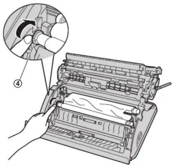 Illustration of a hand operating a printer with a magnified inset showing the blade and internal structure (no text or symbols)