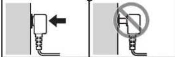 Diagram showing two electrical socket installation methods: one with a left arrow indicating direction, the other with no circular symbol.