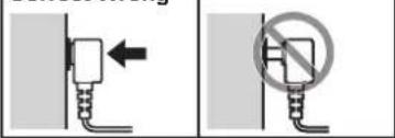 Diagram showing two methods of removing a plug into a socket, with an arrow indicating the direction and a no-smoking symbol.