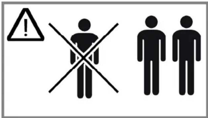 Warning sign with exclamation mark, crossed cross symbol, and two male human figures