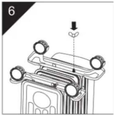 Diagram of a mechanical device with four circular components and an arrow indicating direction (no text or symbols)