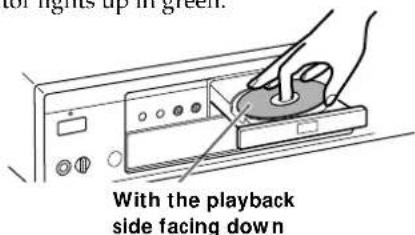 with the playback side facing down