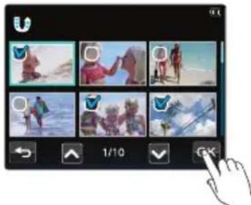 Mobile app interface displaying six video thumbnails with UI controls and a hand cursor pointing at the right.