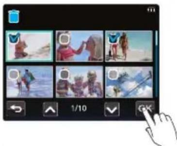 Mobile app interface displaying six video thumbnails with Chinese UI elements, including a hand cursor pointing at the right.