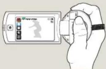 Illustration of a hand holding a smartphone displaying a device with a screen showing a person silhouette and control buttons.