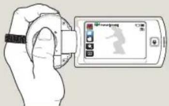 Diagram showing a hand holding a wristwatch next to a smartphone displaying a smart device with a person silhouette and Chinese UI elements.