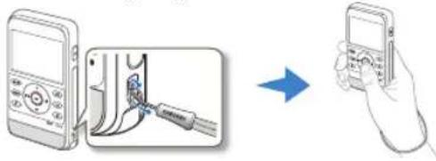 Diagram showing a hand holding a smartphone next to an open mobile phone with a cable being inserted into the cable.