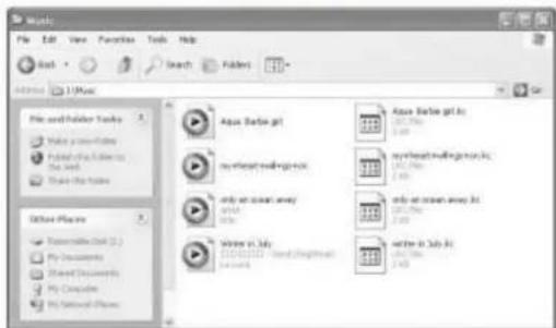 Music File Edit View Favorites Tools Help Back Search Folder Add: 1\Music File and Folder Tasks Make a new file Paste to the Text Share the Text Other Places Automobiles (L) My Documents Shared Documents My Computer My Secreted Files Aqua Barbie.git myristing soundwork.org only at room away write in July Aqua Barbie.git in 20.75% myristing soundwork.org only at room away in write in July in 2.43