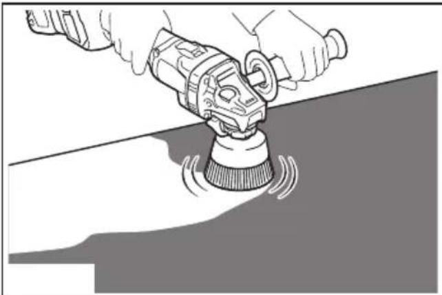 Illustration of a hand using a power tool to clean or brush the surface (no text or symbols visible)