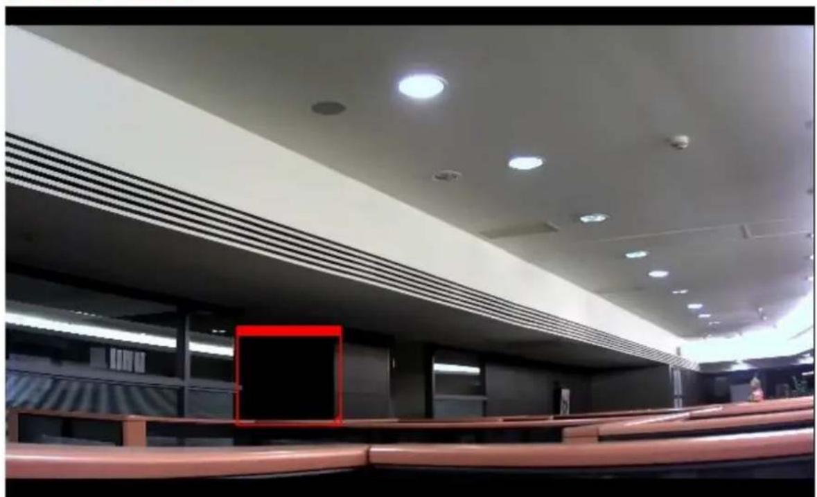 Interior view of a modern, empty auditorium with patterned seating and ceiling lighting (no visible text or symbols)