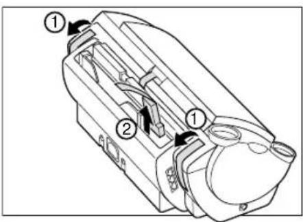 Technical diagram of a mechanical device with numbered components and directional arrows indicating flow or movement.