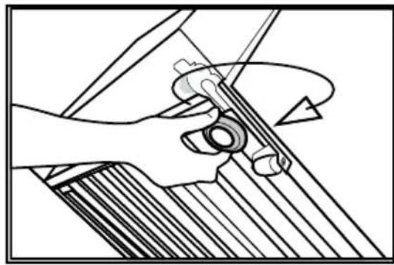 Mechanical diagram showing hands operating a tool with a curved arrow indicating rotation (no text or symbols present)